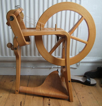 Frank Herring & Sons spinning wheel, bent plywood frame